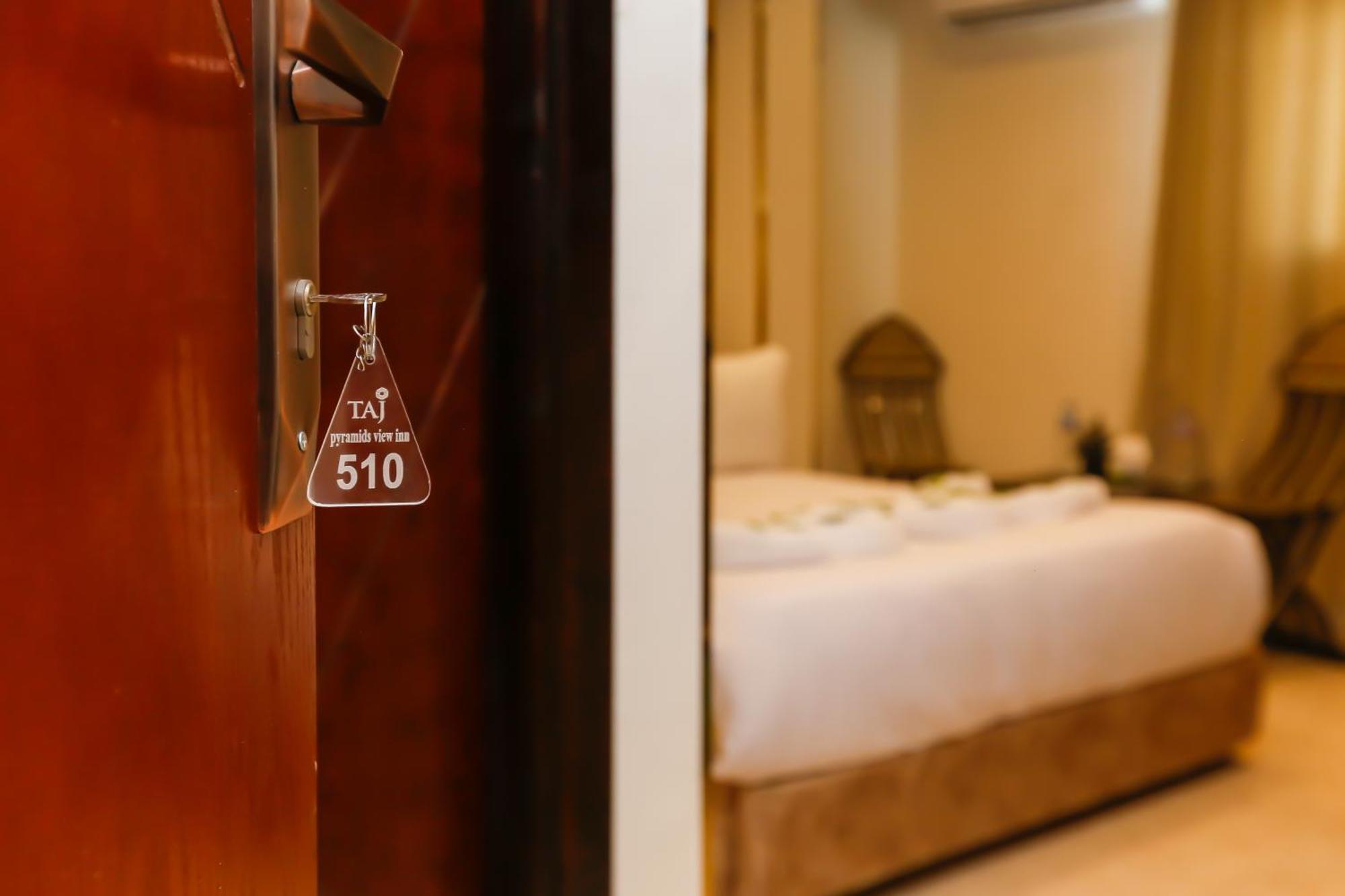 Taj Pyramids View Inn Kafret el-Gabal Kültér fotó